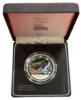 国立公園制度100周年記念貨幣 1000円銀貨プルーフ やんばる国立公園 図案・表面:比地大滝とヤンバルクイナ 裏面:国立公園統一マーク 直径:40.00mm 品位:純銀 量目:31.1g 発行数:40,000枚・プルーフ・造幣局製 額面:千円