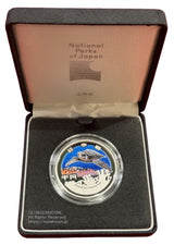 国立公園制度100周年記念貨幣 1000円銀貨プルーフ 慶良間諸島国立公園 図案・表面:サンゴ礁とアオウミガメ 裏面:国立公園統一マーク 直径:40.00mm 品位:純銀 量目:31.1g 発行数:40,000枚・プルーフ・造幣局製 額面:千円