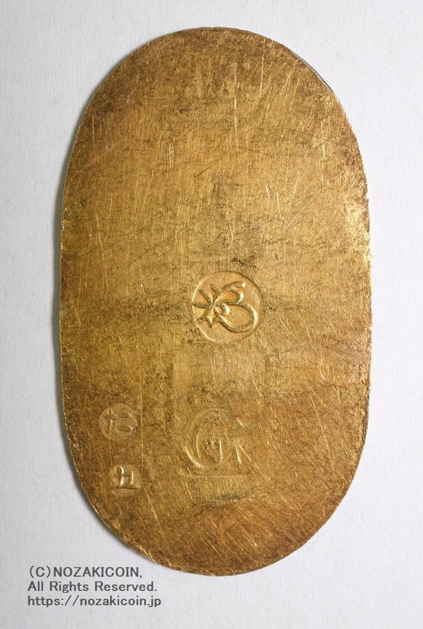 万延小判は万延元年～慶応3年(1860～1867)まで鋳造されました。品位は金574 / 銀426 量目3.3g です。小型で雛小判とも呼ばれます。鑑定書・桐箱付き。