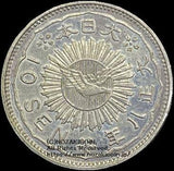 八咫烏銀貨は初めて一般公募による図案が採用されました。  表中央の価額の左右に鳳凰、裏面日章の真ん中に八咫烏が配されています。  銀価格高騰の為、流通しませんでした。  八咫烏10銭銀貨は直径16.06mm 品位は銀720 / 銅280 量目は1.50gです。  大正8年（1919）鑑定書付。