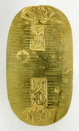 元文小判は元文元年～文政元年(1736～1818)まで鋳造されました。 背に真書体の文の字の刻印があり真文小判とも呼ばれています。 品位は金653 / 銀347 量目13.00g です。 鑑定書・桐箱付き。磨きあり