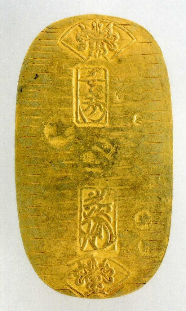 元文小判は元文元年～文政元年(1736～1818)まで鋳造されました。 背に真書体の文の字の刻印があり真文小判とも呼ばれています。 品位は金653 / 銀347 量目13.00g です。 鑑定書・桐箱付き。